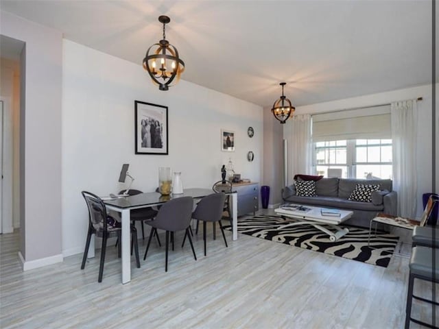 100 Oceana Dr W Unit 4J, Brooklyn, NY 11235 - dining space with a chandelier and wood finished floors