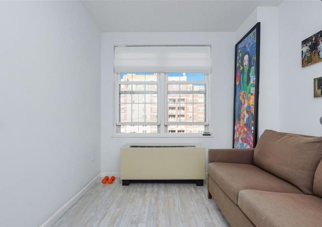 100 Oceana Dr W Unit 4J, Brooklyn, NY 11235 - sitting room featuring radiator and light wood finished floors