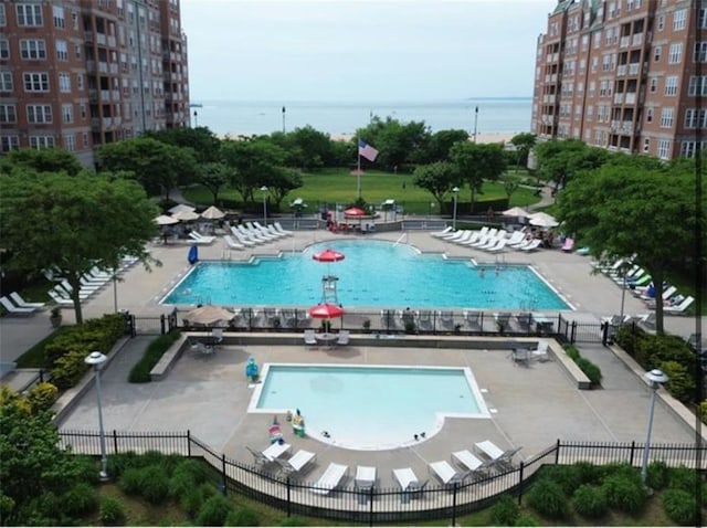 100 Oceana Dr W Unit 4J, Brooklyn, NY 11235 - community pool featuring a patio