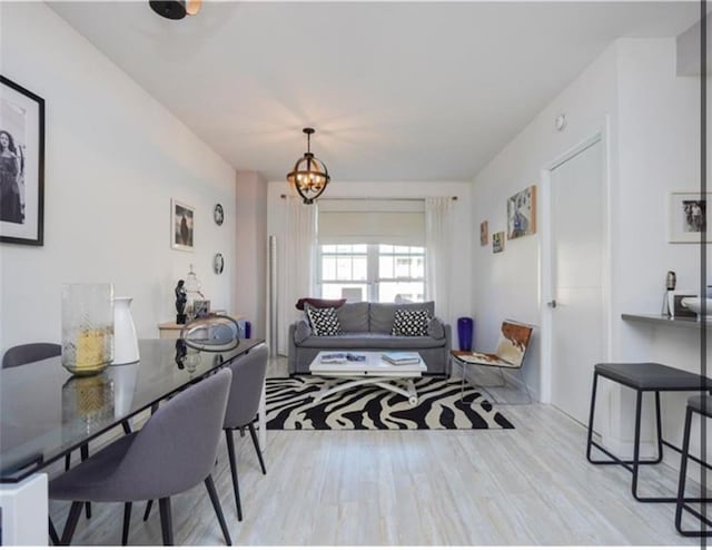 100 Oceana Dr W Unit 4J, Brooklyn, NY 11235 - living room featuring a chandelier and wood finished floors
