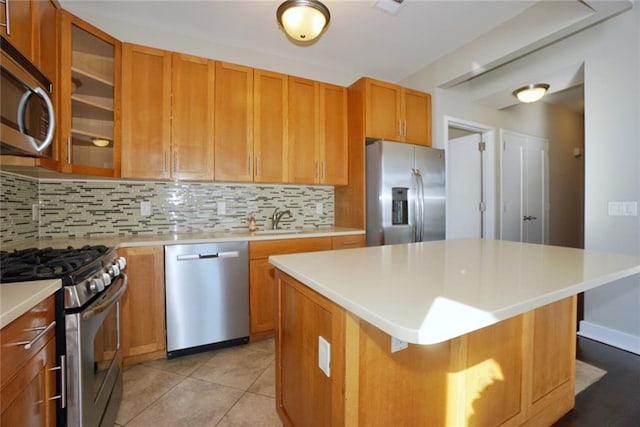 90 Bay Street Lndg Unit 4B, Staten Island, NY 10301 - kitchen with appliances with stainless steel finishes, tasteful backsplash, and light countertops