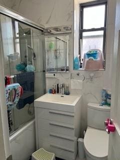 1855 E 12th St Unit 4M, Brooklyn, NY 11229 - bathroom featuring enclosed tub / shower combo and vanity