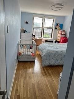 1855 E 12th St Unit 4M, Brooklyn, NY 11229 - bedroom with wood finished floors and baseboards
