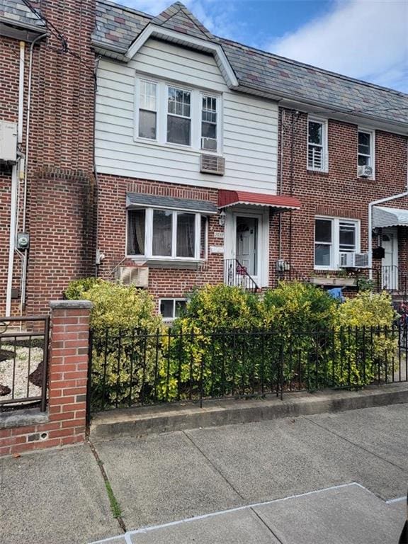2037 Ford St, Brooklyn, NY 11229 - multi unit property featuring a high end roof, a fenced front yard, and brick siding