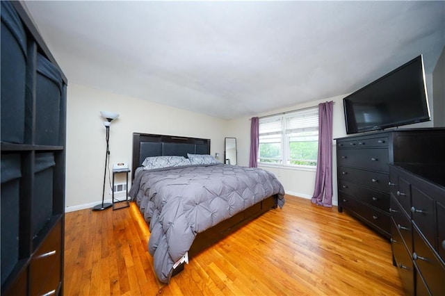 394 Stobe Ave, Staten Island, NY 10306 - bedroom with baseboards and light wood-style floors
