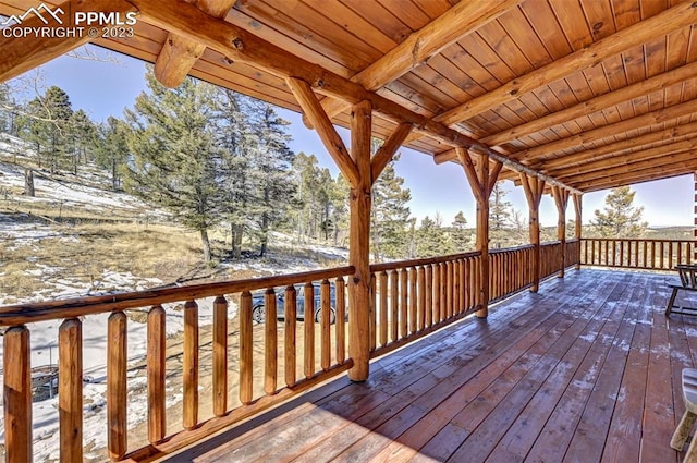 view of snow covered deck