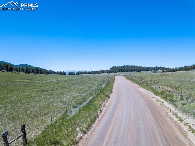 view of road featuring a rural view