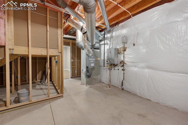 basement featuring water heater