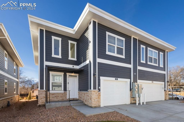 view of front of property with a garage