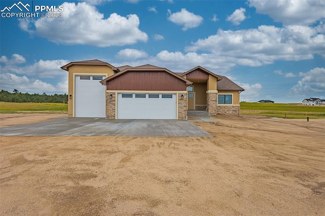 view of front of property featuring a garage