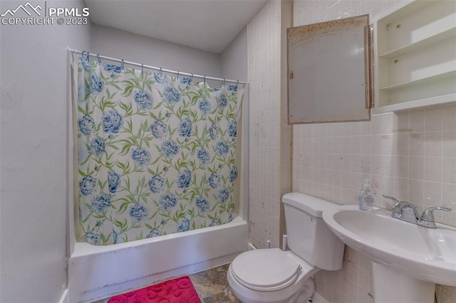 full bathroom with tile walls, shower / bathtub combination with curtain, tile floors, backsplash, and toilet