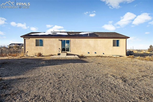 rear view of property with a patio area