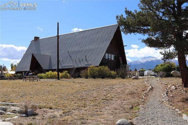 view of home's exterior featuring a mountain view