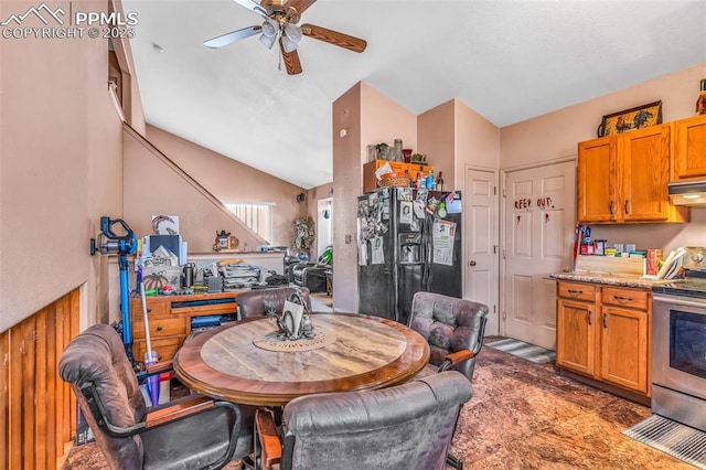 dining room featuring lofted ceiling and ceiling fan