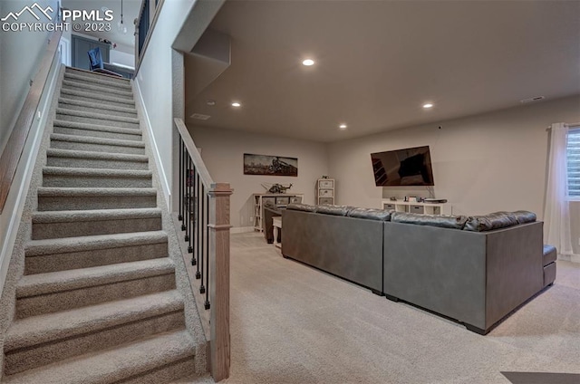 living room featuring light colored carpet