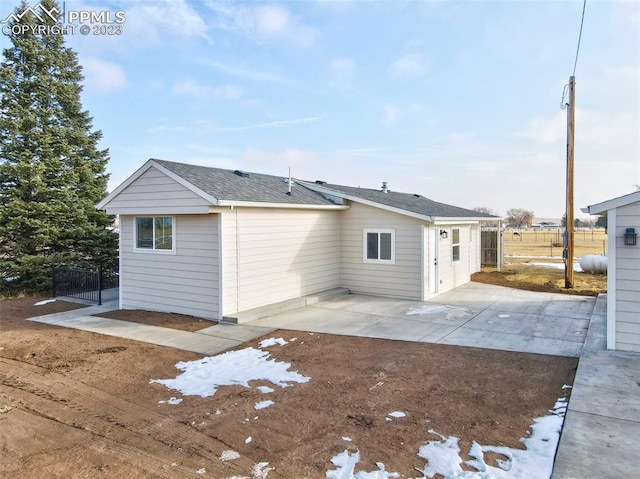 back of property with a patio area