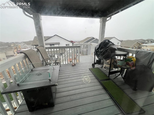 5649 Makalu Dr, Colorado Springs, CO 80924 - wooden terrace with a residential view