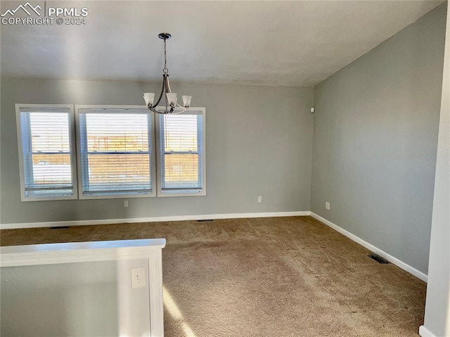 9785 N Calhan Hwy, Calhan, CO 80808 - interior space with a wealth of natural light, dark colored carpet, baseboards, and a chandelier