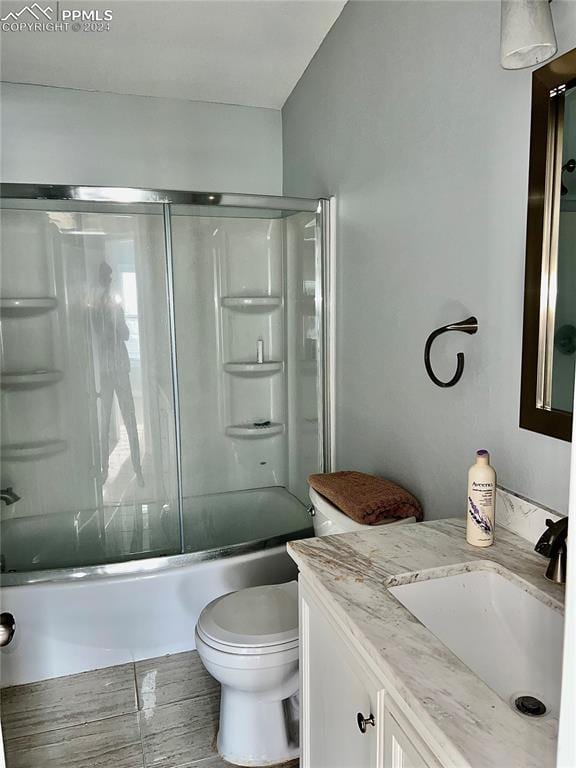 9785 N Calhan Hwy, Calhan, CO 80808 - full bath with bath / shower combo with glass door, vanity, and toilet
