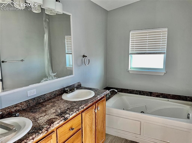 9785 N Calhan Hwy, Calhan, CO 80808 - full bathroom with a sink, double vanity, and a whirlpool tub