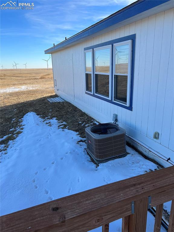 9785 N Calhan Hwy, Calhan, CO 80808 - view of snowy exterior featuring central AC