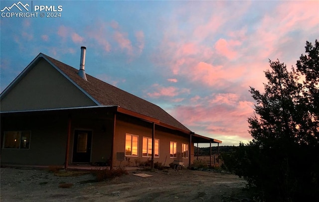 view of property exterior at dusk