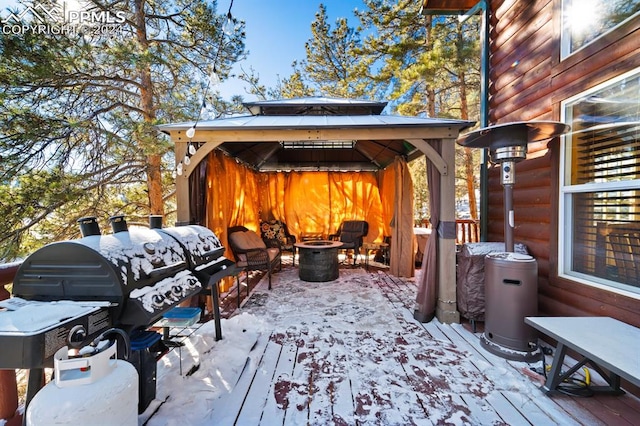 exterior space with a deck and a gazebo