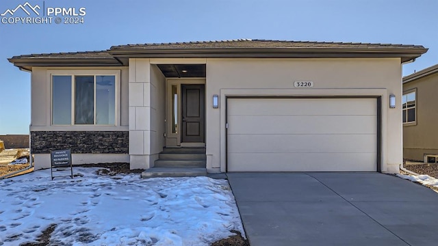 view of front of house with a garage