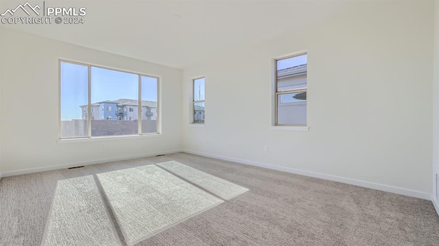 view of carpeted spare room