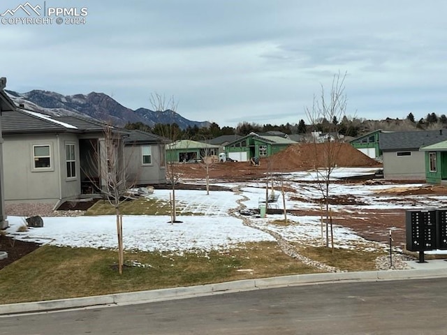 exterior space featuring a mountain view