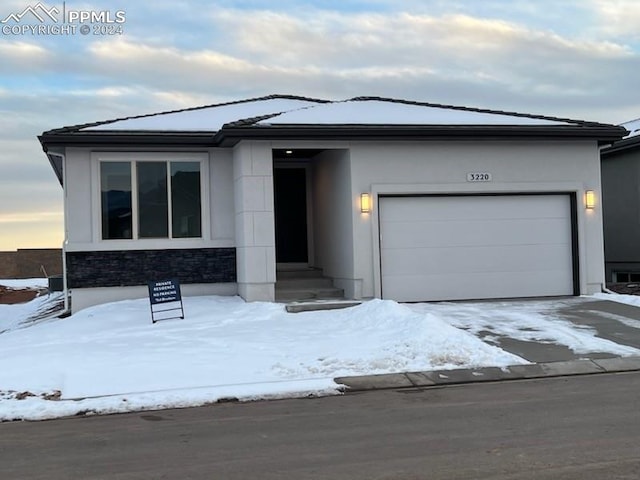 view of front of home with a garage