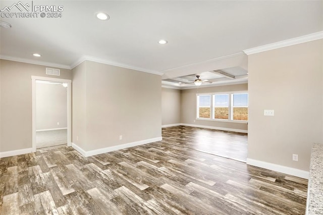 unfurnished room featuring coffered ceiling, dark hardwood / wood-style floors, ceiling fan, beam ceiling, and ornamental molding