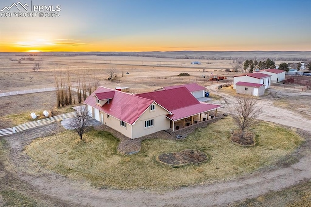 aerial view at dusk with a rural view