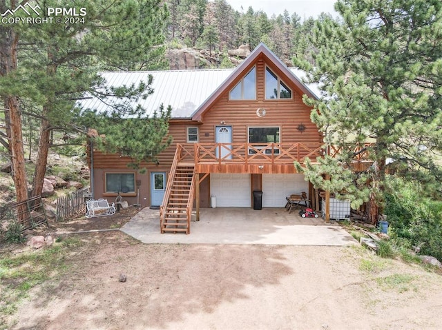 cabin featuring a garage