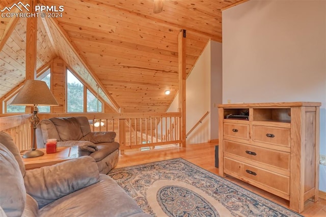 living room with wood ceiling, lofted ceiling, ceiling fan, and light wood-type flooring