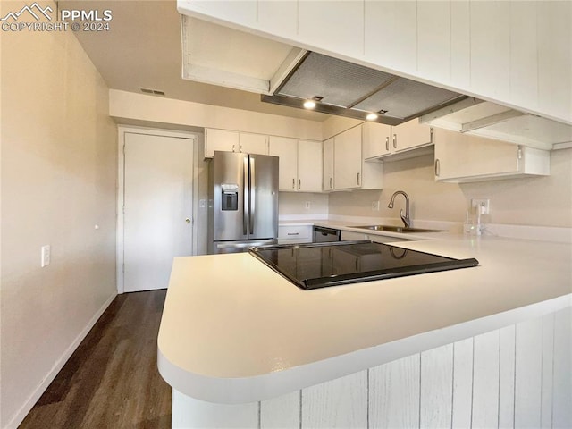 kitchen featuring white cabinetry, black electric cooktop, sink, stainless steel refrigerator with ice dispenser, and dark hardwood / wood-style flooring