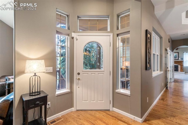 foyer with light hardwood / wood-style floors