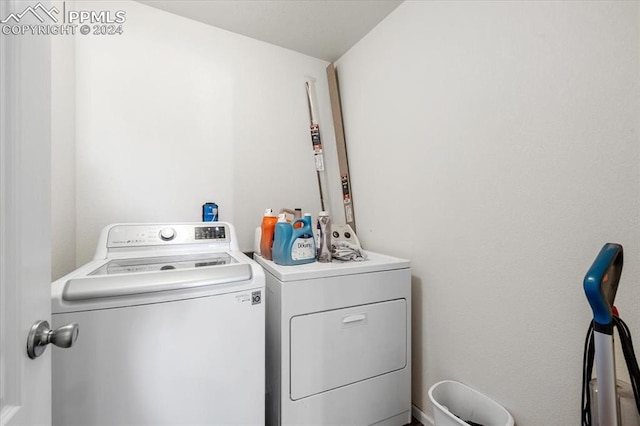 laundry room with independent washer and dryer