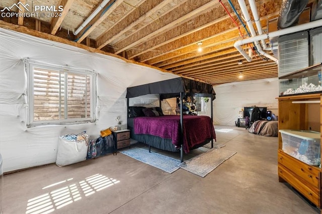 bedroom with concrete flooring