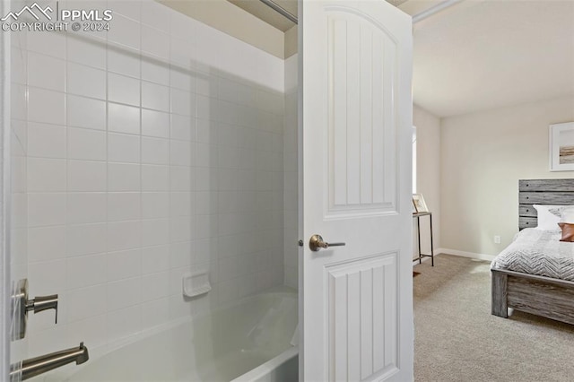 bathroom with tiled shower / bath combo