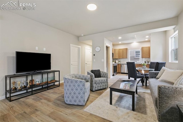 living room with light hardwood / wood-style floors