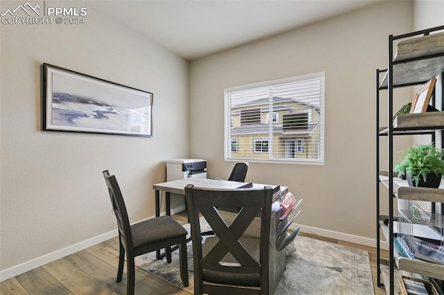 office space with light hardwood / wood-style flooring