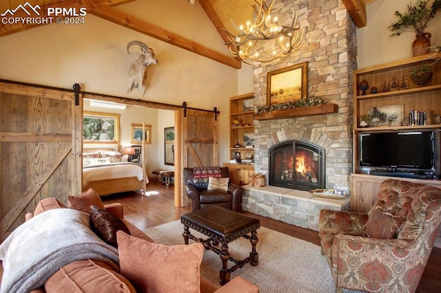 living room featuring a barn door, a notable chandelier, dark wood-type flooring, and beamed ceiling