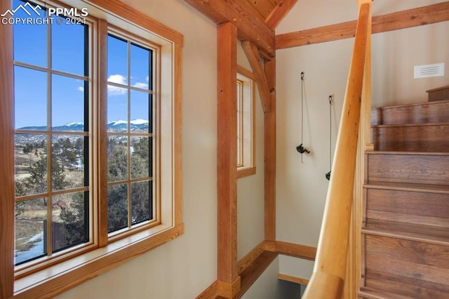 stairway featuring a mountain view