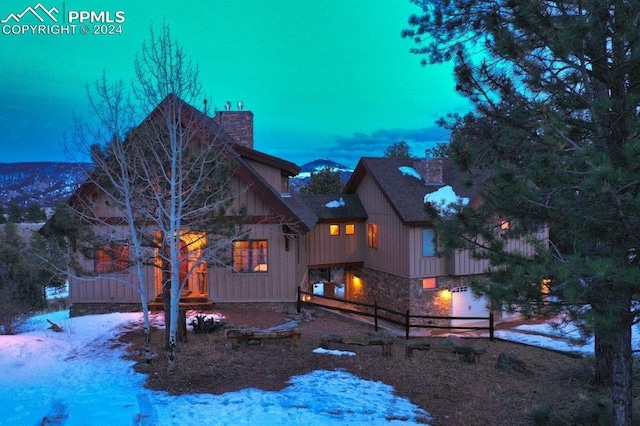 view of snow covered property