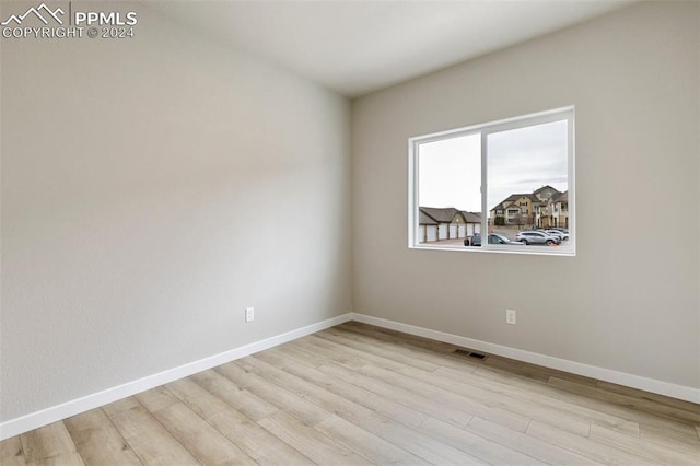 empty room featuring light hardwood / wood-style floors