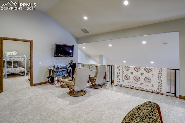 recreation room with lofted ceiling and light colored carpet