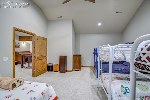 bedroom featuring light colored carpet and ceiling fan