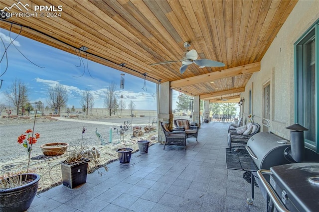 view of patio / terrace featuring an outdoor living space and ceiling fan