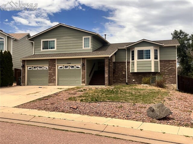 view of front of property with a garage